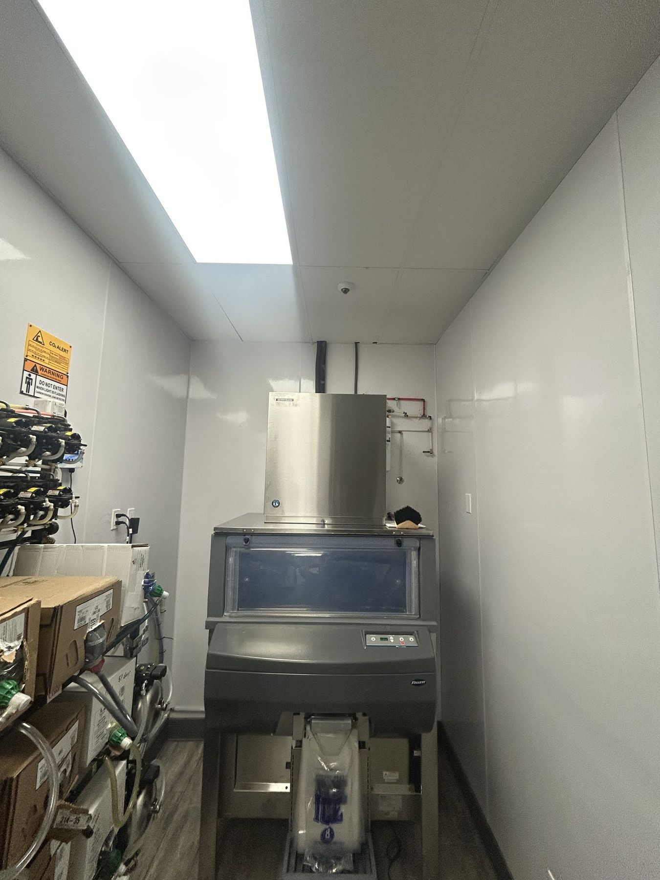 Commercial ice machine and storage bin installed in a back-of-house service room in St. George, Utah